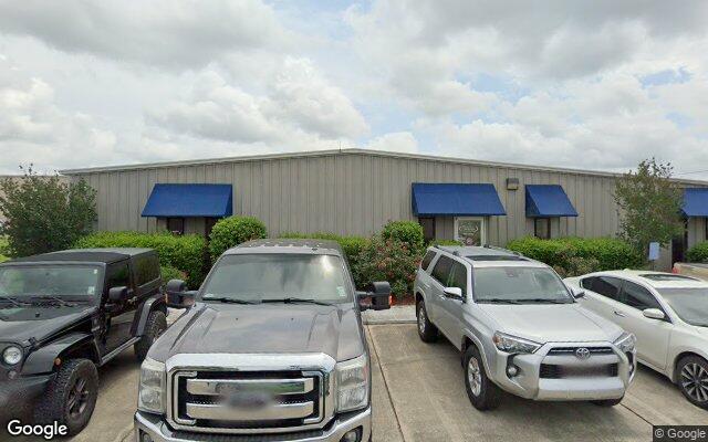 Street view of 128 Millstone Rd, 11,550 SF industrial/warehouse building in Broussard, LA