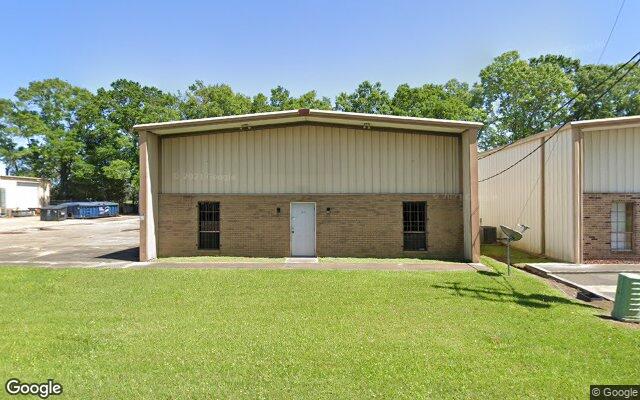 Street view of 104A Burgess Drive, 5,000 SF industrial/warehouse building in Broussard, LA