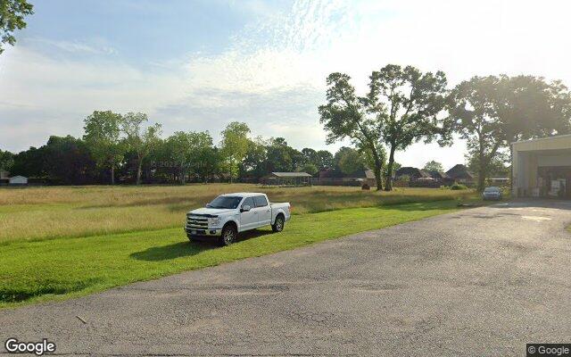 Street view of 212 Burgess Dr, 12,000 SF industrial/warehouse building in Broussard, LA