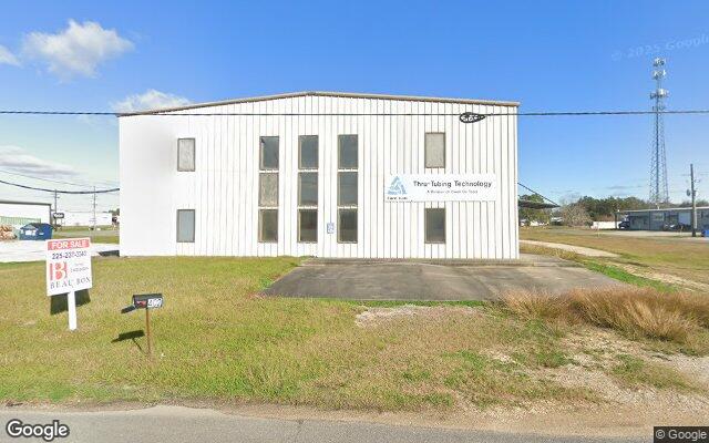 Street view of 402 Machine Loop, 8,460 SF industrial/warehouse building in Scott, LA