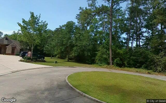 Street view of 205, 207 Village Cir, 0.54 acres of land in Slidell, LA