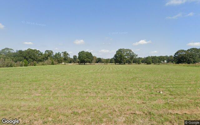 Street view of 800 Blk Hector Connoly Rd, 12.56 acres of land in Carencro, LA