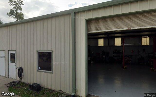 Street view of 925 Lafitte St, 12,800 SF industrial/warehouse building in Mandeville, LA
