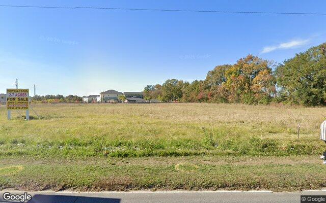 Street view of 7701 Plank Rd, 82,000 SF school building in Baton Rouge, LA